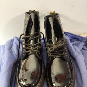 Dr. Martens Black Leather Boots with Gold Accents